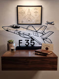 Lampada LED con silhouette 3D del caccia F35 su base illuminata
