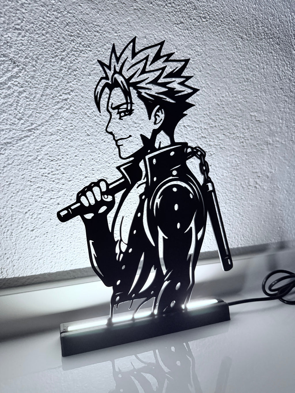 Lampada LED Ban con bastone sulla spalla, dettaglio della silhouette