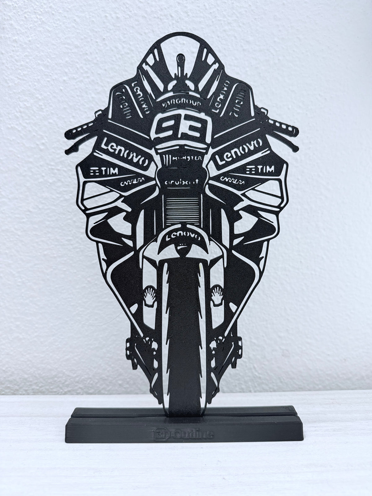 Silhouette 3D frontale della Ducati di Marc Marquez su base senza LED