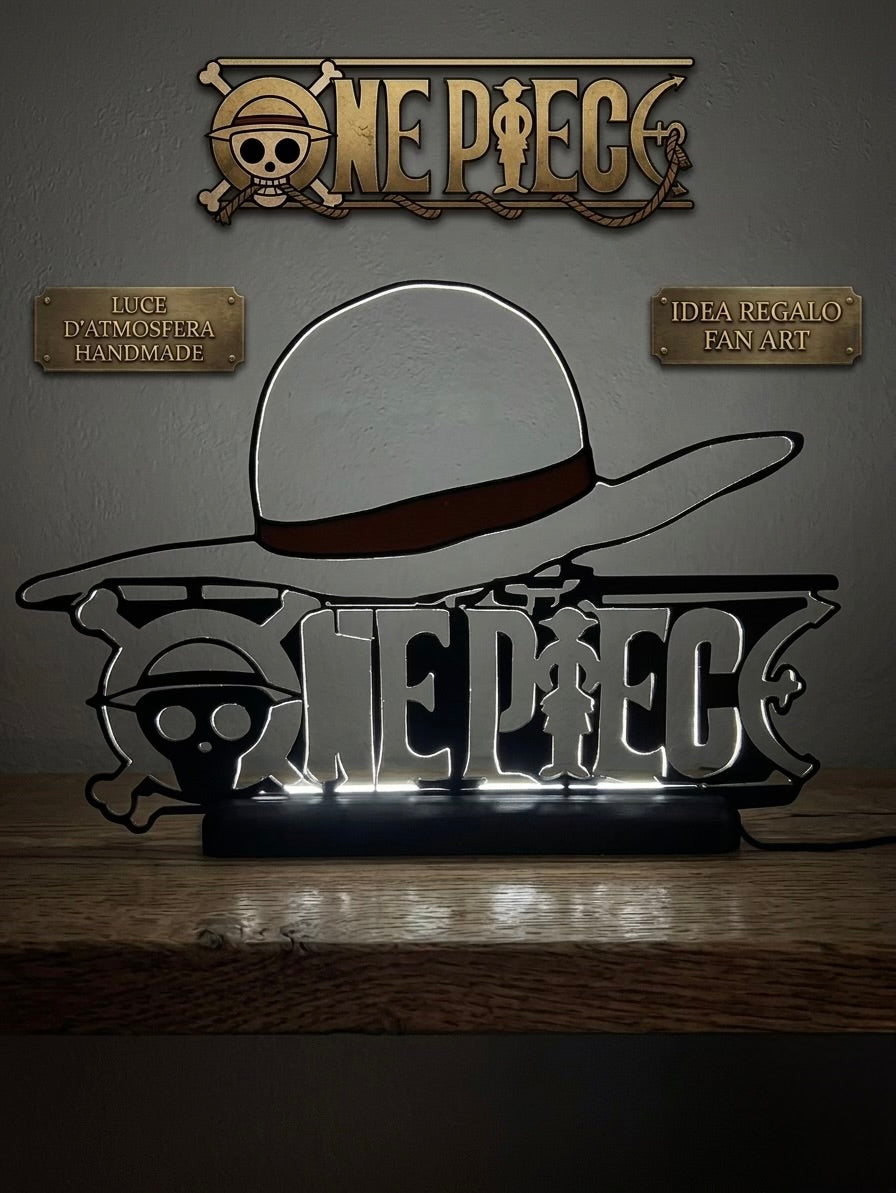 Lampada LED con silhouette 3D del logo One Piece su base illuminata