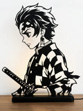 Lampada LED con silhouette 3D di Tanjiro Kamado di Demon Slayer con la spada