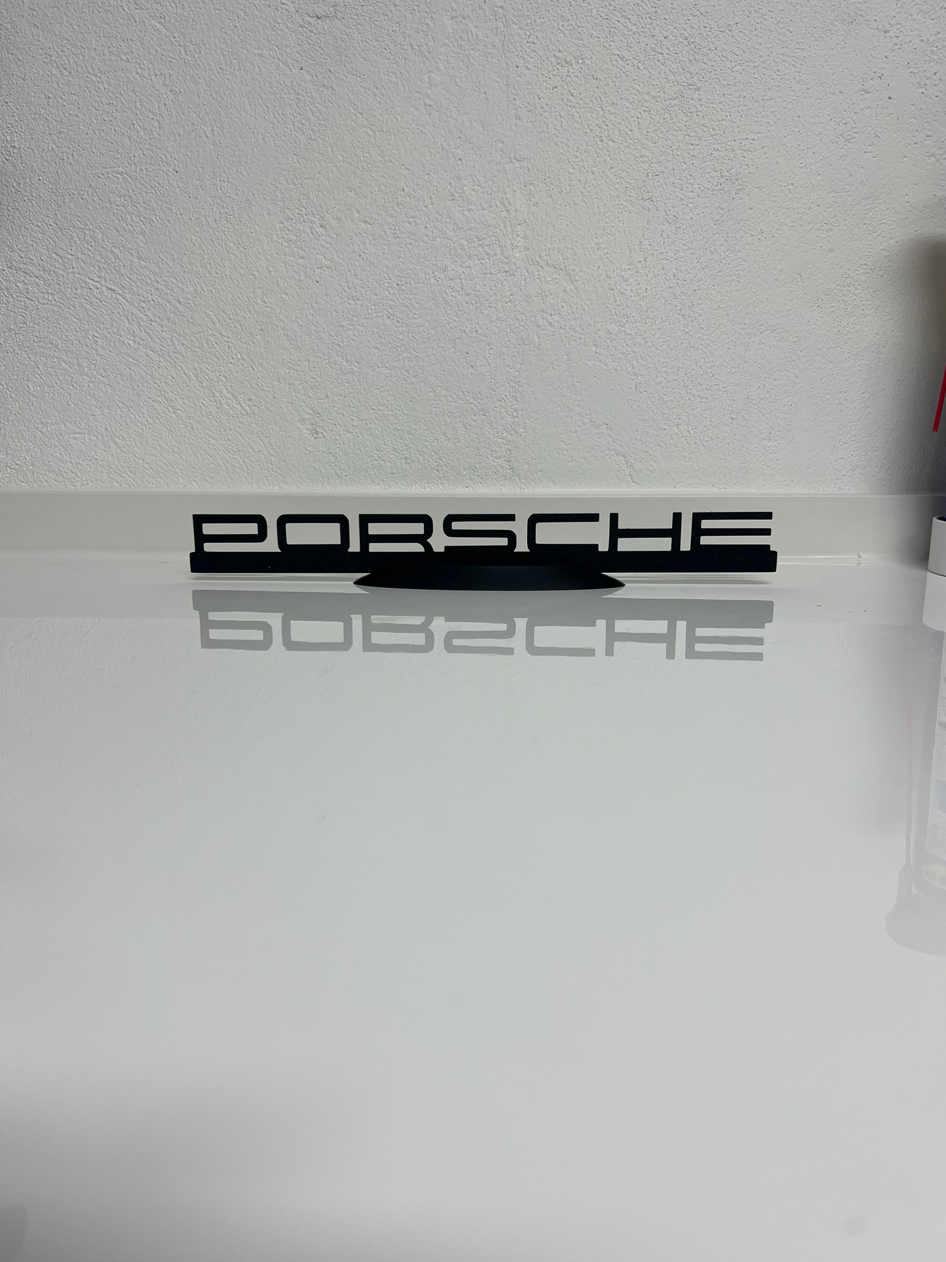 Silhouette da esposizione logo Porsche