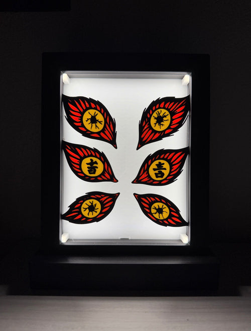 Quadro luminoso LED con gli occhi di Kokushibo di Demon Slayer acceso